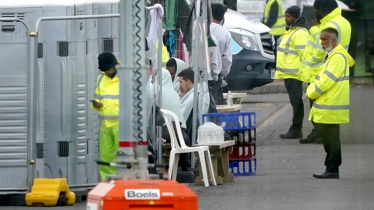People thought to be migrants at the Manston immigration facility in Thanet, Kent