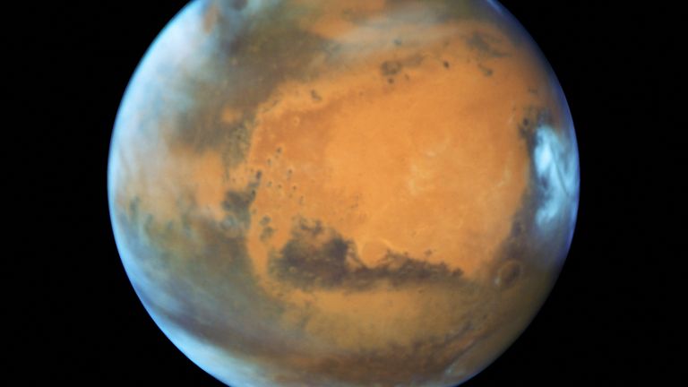 FILE PHOTO: The planet Mars is shown May 12, 2016 in this NASA Hubble Space Telescope view taken May 12, 2016. NASA/Handout via Reuters ATTENTION EDITORS - THIS IMAGE WAS PROVIDED BY A THIRD PARTY. EDITORIAL USE ONLY/File Photo