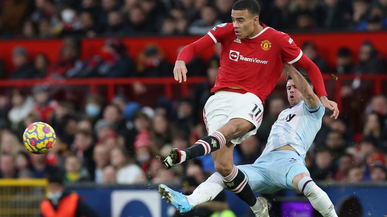 Greenwood pictured during Old Trafford's clash with West Ham United's Aaron Cresswell in January this year 