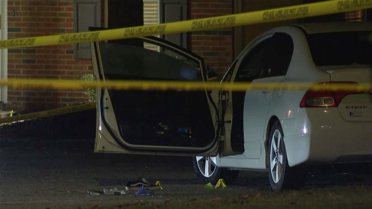 Law enforcement officers work at a crime scene in the Hedingham and Newes River Trail districts of Raleigh, North Carolina, Thursday, October 13, 2022. Near the capital of North Carolina, he fled toward a promenade where he opened fire, killing and wounding others.(AP Photo/Allen Breed)