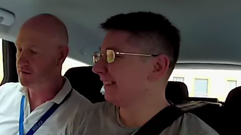 Pawel Relowicz (R) appeared to laugh after being told of his arrest for Libby&#39;s rape and murder. Pic: Libby, Are You Home Yet? Sky and Candour Productions