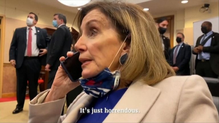 The Jan 6 Committee has released previously unseen footage of congressional leaders phoning officials for help during the assault.
