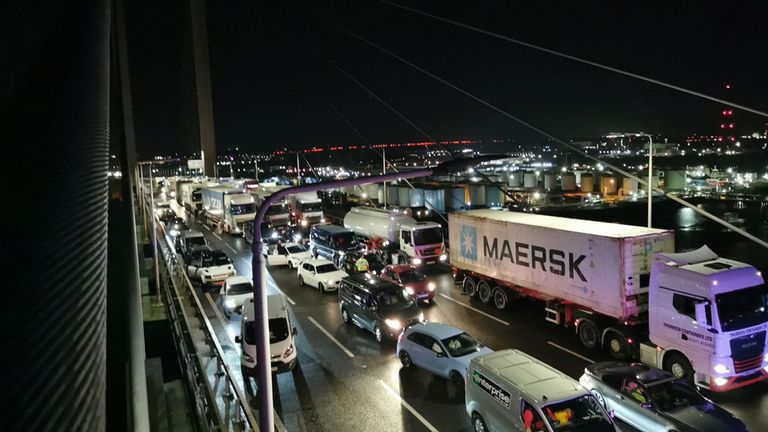  Handout photo issued by Just Stop Oil of traffic stopped after two of their activists scaled the Queen Elizabeth II Bridge at the Dartford Crossing on Monday. Police have closed the major road bridge linking Essex and Kent after a report that two people have "climbed onto the bridge and are currently at height". Issue date: Monday October 17, 2022.
