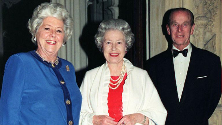 Britain's Queen Elizabeth II (centre) arrives with the Duke of Edinburgh at the Palace of Westminster on November 25 for a dinner hosted by Speaker of the House Betty Boothroyd (left).  ** POOR QUALITY DOCUMENTS **