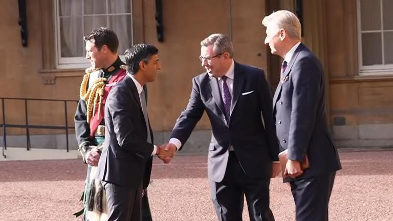 Rishi Sunak heads into Buckingham Palace to meet the King, where he will be officially appointed prime minister and will be asked to form a government.
