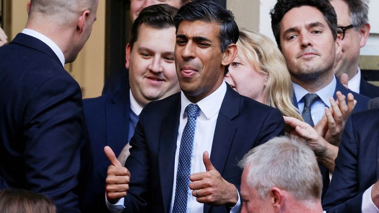New leader of the Britain&#39;s Conservative Party Rishi Sunak gestures outside the Conservative Campaign Headquarters, in London, Britain October 24, 2022. REUTERS/Kevin Coombs