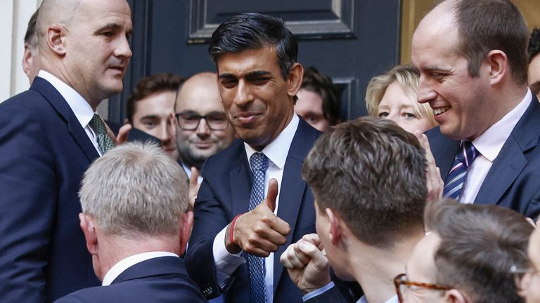 New leader of Britain&#39;s Conservative Party Rishi Sunak gives the thumbs-up outside the party&#39;s headquarters in London, Britain, October 24, 2022. REUTERS/Henry Nicholls