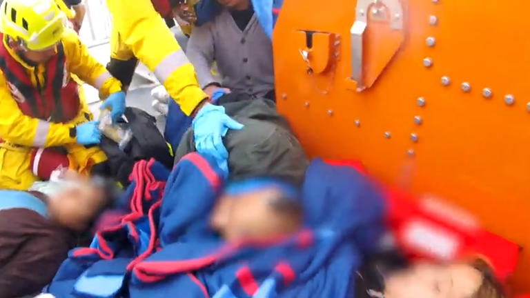 RNLI crew rescue migrants from the English Channel 