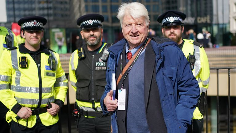 Stanley Johnson passes a group of police officers as he arrives at the Conservative Party annual conference at the International Convention Centre in Birmingham. Picture date: Monday October 3, 2022.