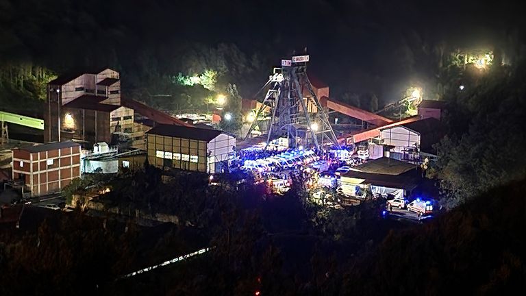 A view of the entrance to the Amasra mine in Turkey's Black Sea coastal province of Bartin, Friday, Oct. 14, 2022. An official said an explosion inside a mine of coal in northern Turkey had trapped dozens of miners.  At least 14 came out alive.  The cause of Friday's explosion in the town of Amasra in the Black Sea coastal province of Bartin was not immediately known.  (IHA via AP)