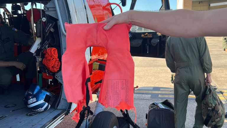One of the boater&#39;s life jackets is torn due to a shark attack. Pic: U.S. Coast Guard Heartland/Facebook