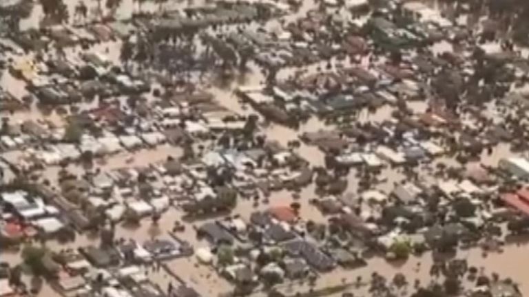 Aerial footage shows extensive flooding in Rochester, Victoria, where a 71-year-old man was found ead in flood waters. 