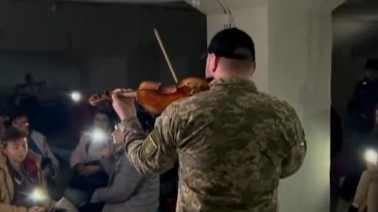 The Ukrainian Ministry of Defence has shared a video online showing a violinist playing to civilians taking shelter after warnings of an air raid.