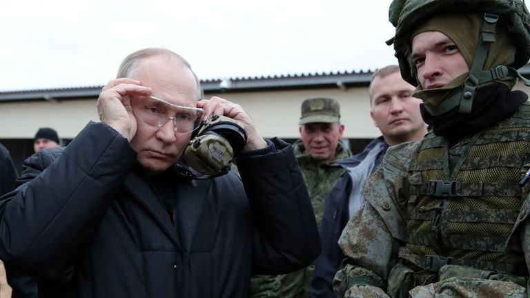 Russian President Vladimir Putin wears glasses as he visits a training centre of the Western Military District for mobilised reservists, in Ryazan Region, Russia October 20, 2022. Sputnik/Mikhail Klimentyev/Kremlin via REUTERS ATTENTION EDITORS - THIS IMAGE WAS PROVIDED BY A THIRD PARTY.
