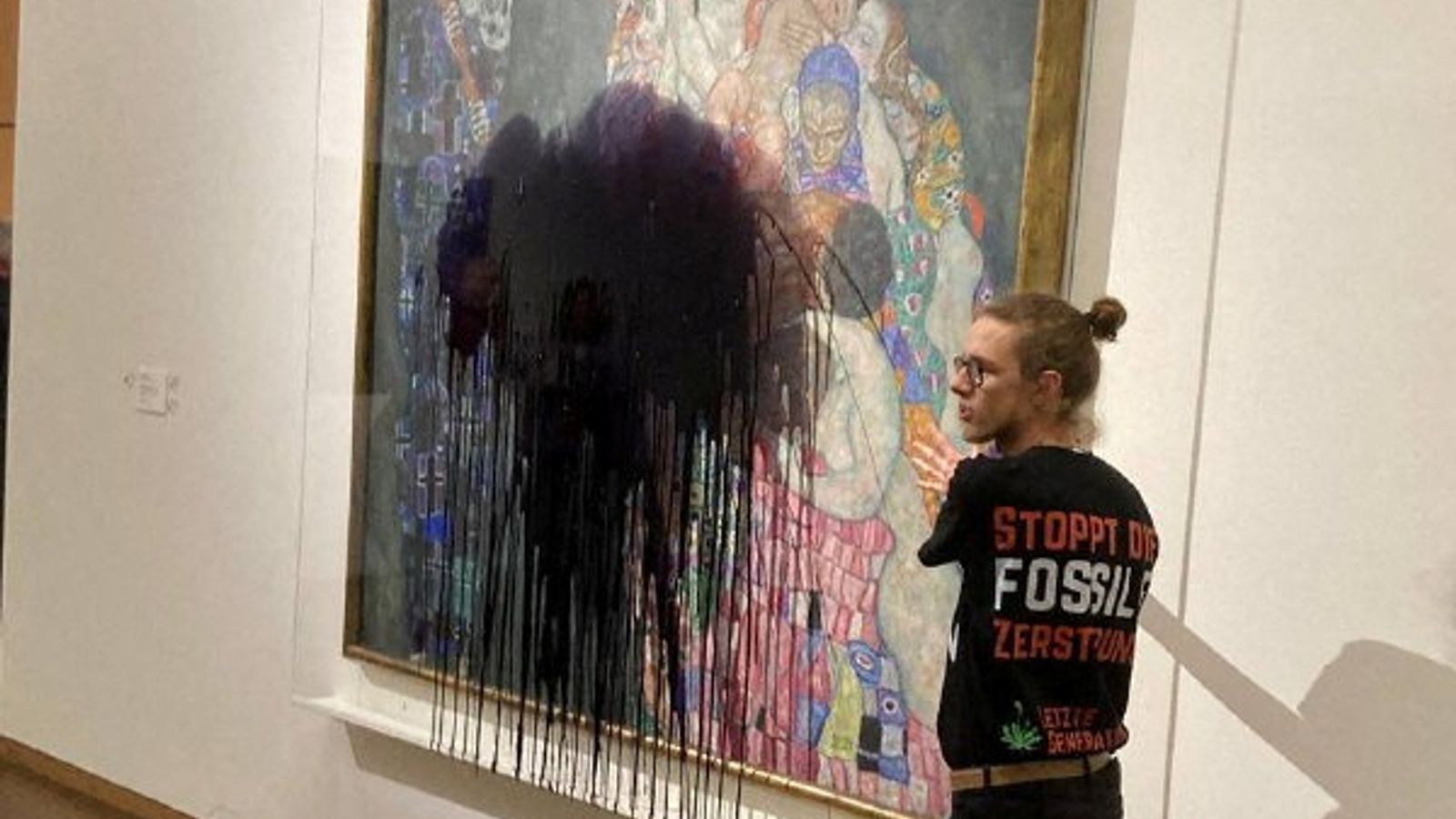 Climate activist attacks Gustav Klimt painting while another glues himself to the frame