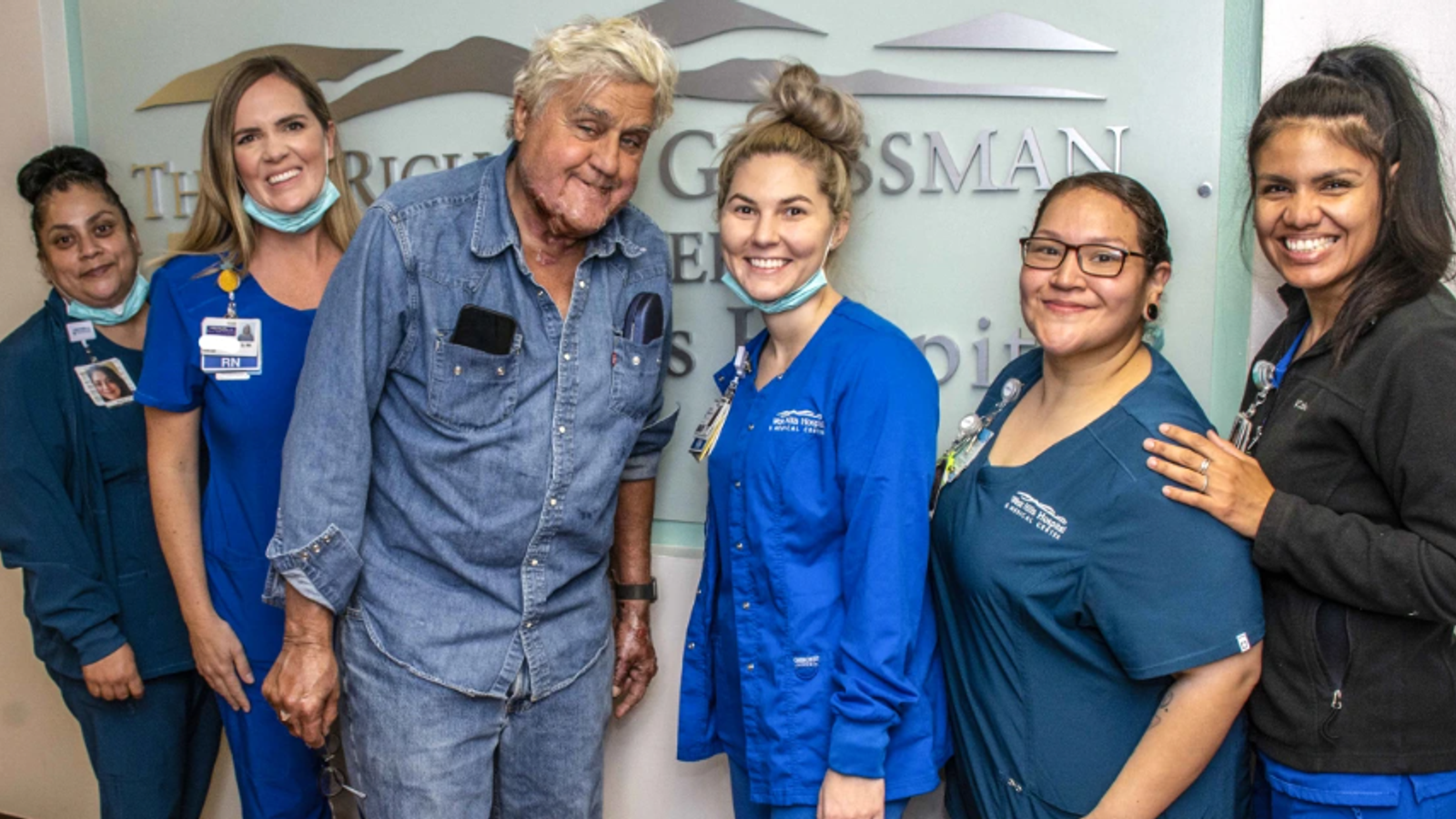 Jay Leno pictured leaving hospital after being badly burned in car fire