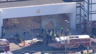 Emergency responders on the scene of the crash outside the Apple store