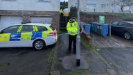Police at the scene in Wildmill, Bridgend, South Wales after three people were arrested following the discovery of the bodies of two babies in a house. Picture date: Monday November 28, 2022.