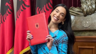 Dua Lipa shared this image of her signing paperwork for her Albanian citizenship at Tirana city hall. Pic: Dua Lipa