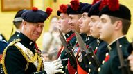 Then Prince Charles with members of the Black Watch Regiment in Montreal, Quebec, in 2009


