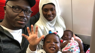 Aboubacarr Drammeh with his wife and children