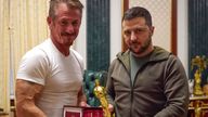 Ukrainian President Volodymyr Zelenskyy, right, poses with US actor Sean Penn after receiving the star&#39;s Oscar statuette and handing him the Order of Merit, III degree during a meeting in Kyiv. Pic: Ukrainian Presidential Press Office/AP
