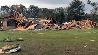 Scenes of devastation are visible in all directions along Lamar County Road 35940, west of State Highway 271, after a massive tornado hit the area, causing extensive damage and destroying an unknown number of homes, Friday, Nov. 4, 2022 in Powderly, Texas. (Jeff Forward/The Paris News via AP)