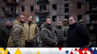 Ukraine&#39;s President Volodymyr Zelenskyy visits a site of a residential building destroyed by a Russian missile attack,
