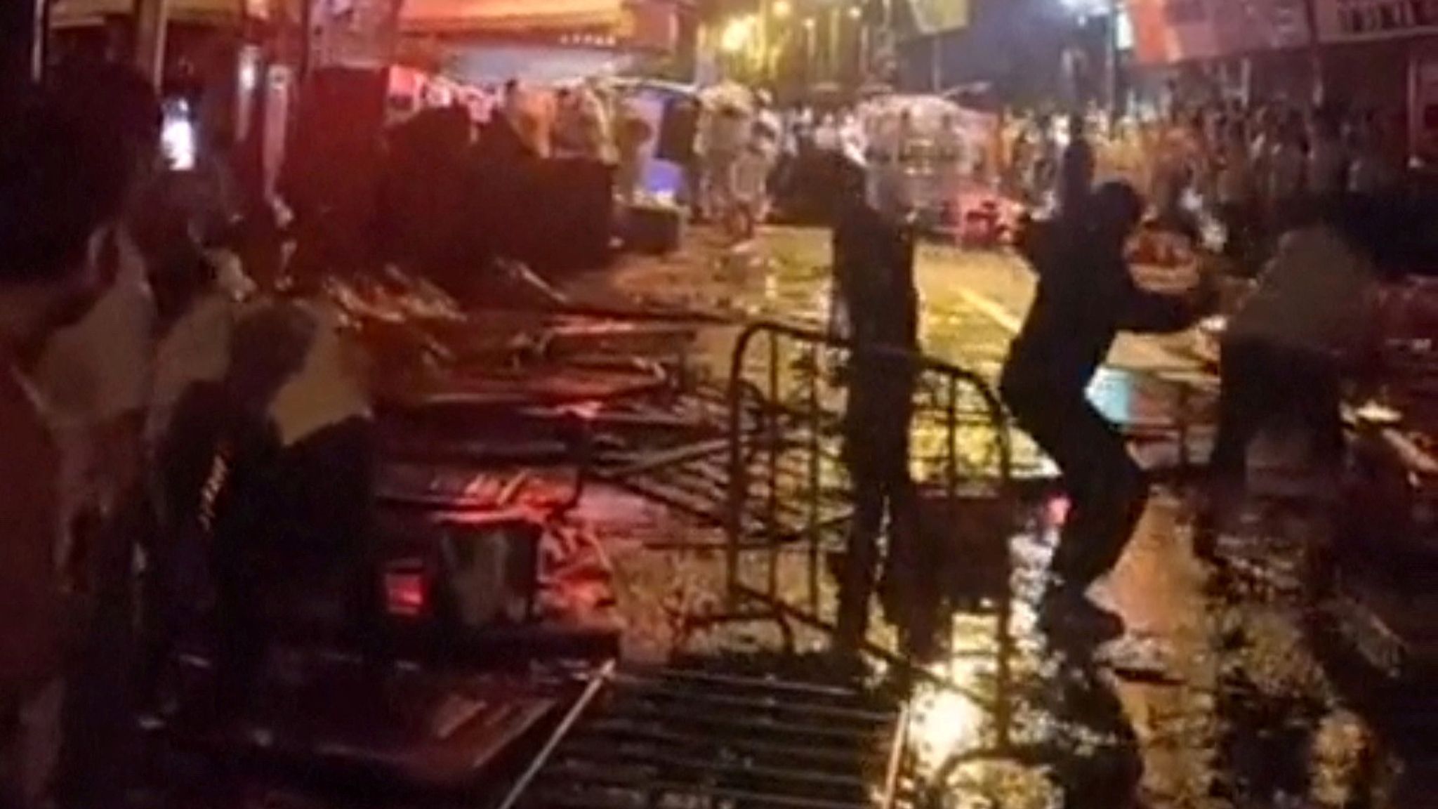 Crowds in major Chinese city Guangzhou clash with riot police in hazmat ...