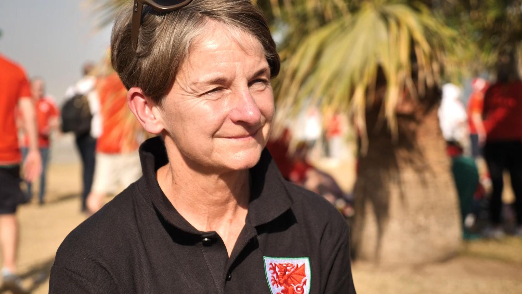 Ex-Wales Laura McAllister is among female football fans 'told to take off  their rainbow bucket hats'