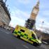 An ambulance is driven past the Houses of Parliament as it attends an emergency call, amidst the spread of the coronavirus disease (COVID-19) pandemic, in London, Britain, January 28, 2022. REUTERS/Toby Melville