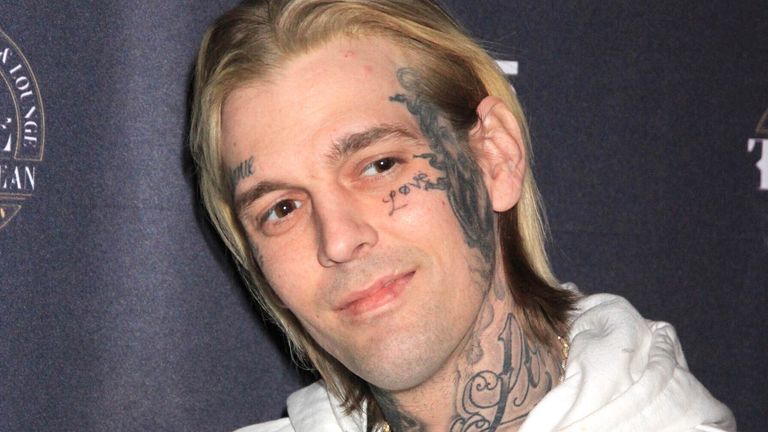 Aaron Carter shows off facial tattoos in his later life.  Photo: AP