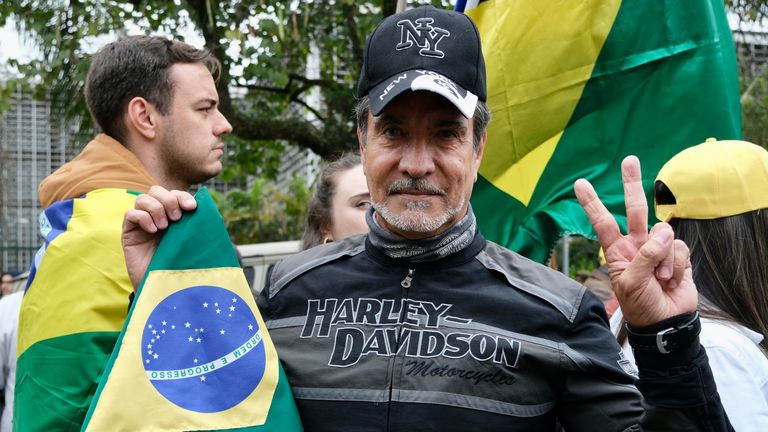 Supporters of Jair Bolsonaro protest against the victory of Lula da Silva in the streets of São Paulo.  Stuart Ramsay eyewitness