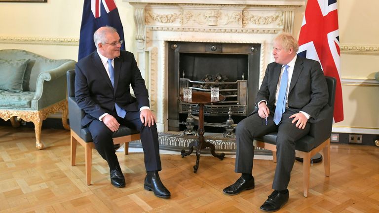 Britain&#39;s Prime Minister Boris Johnson and Australia&#39;s Prime Minister Scott Morrison speak at 10 Downing Street, ahead of a meeting to formally announce a trade deal, in London, Britain, June 15, 2021. Dominic Lipinski/Pool via REUTERS