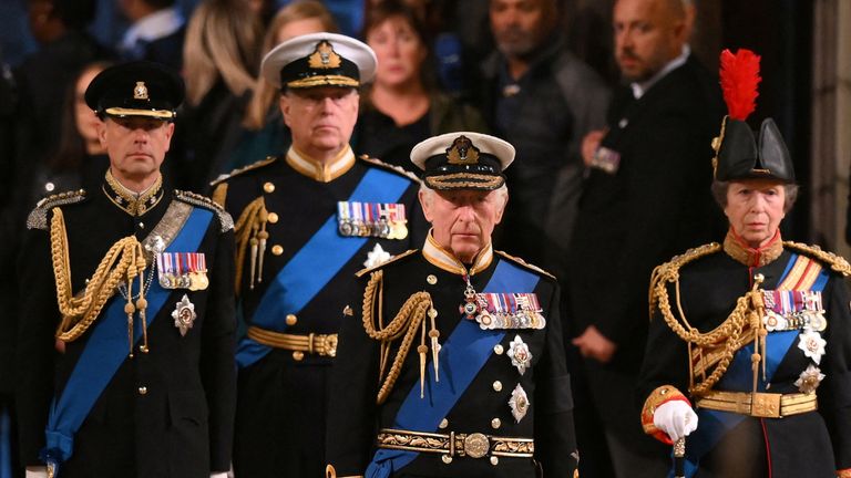 Britain&#39;s King Charles III, Britain&#39;s Princess Anne, Princess Royal, Britain&#39;s Prince Andrew, Duke of York, and Britain&#39;s Prince Edward, Earl of Wessex mount a vigil around the coffin of Queen Elizabeth II, draped in the Royal Standard with the Imperial State Crown and the Sovereign&#39;s orb and sceptre, lying in state on the catafalque in Westminster Hall, at the Palace of Westminster in London on September 16, 2022. DANIEL LEAL/Pool via REUTERS