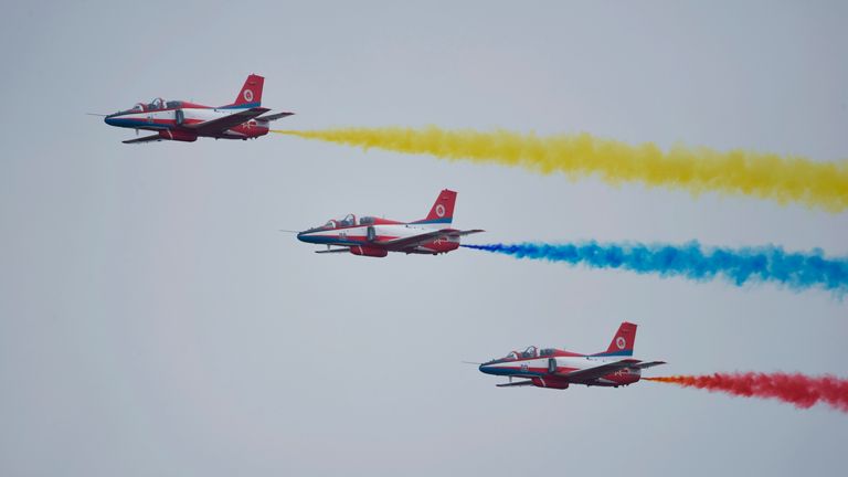The Red Eagle aerobatic team performing in Zhuhai.  Photo: FeatureChina via AP