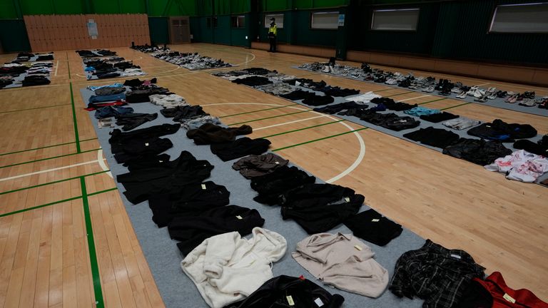 Halloween festivities, are placed at a temporary lost and found center at a gym in Seoul, South Korea, Tuesday, Nov. 1, 2022. Police have assembled the crumpled tennis shoes, loafers and Chuck Taylors, part of 1.5 tons of personal objects left by victims and survivors of the tragedy, in hopes that the owners, or their friends and family, will retrieve them. (AP Photo/Lee Jin-man)
APIC:AP