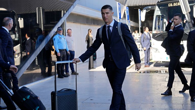 Portugal&#39;s Cristiano Ronaldo arrives with the Portuguese team at Lisbon airport to depart for the World Cup in Qatar. Pic: AP