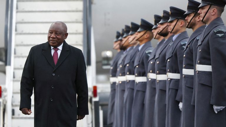 Members of the Royal Air Force (RAF) welcome South African President Cyril Ramaphosa, as he arrives at Stansted airport