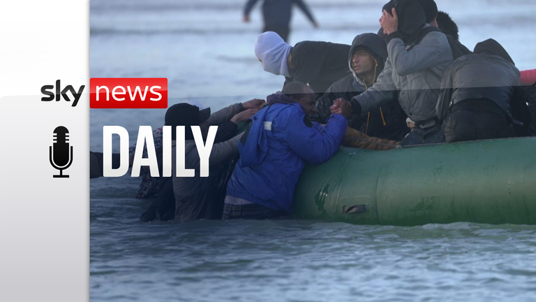 Migrants try to get on dinghies in Calais. 