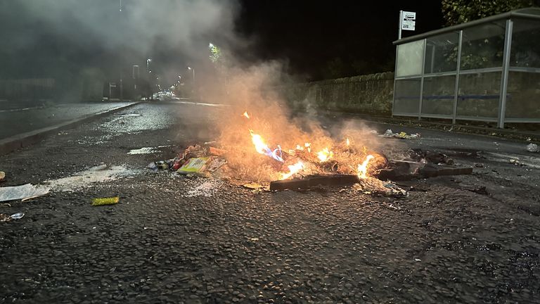 The scene in the Niddrie area of Edinburgh on Saturday night after a serious disturbance, which echoed scenes seen in Dundee earlier this week, with police urging people to stay indoors. A road was blockaded with fire and motorbikes raced through part of the Scottish capital amid scenes of Bonfire Night chaos. Picture date: Saturday November 5, 2022.

