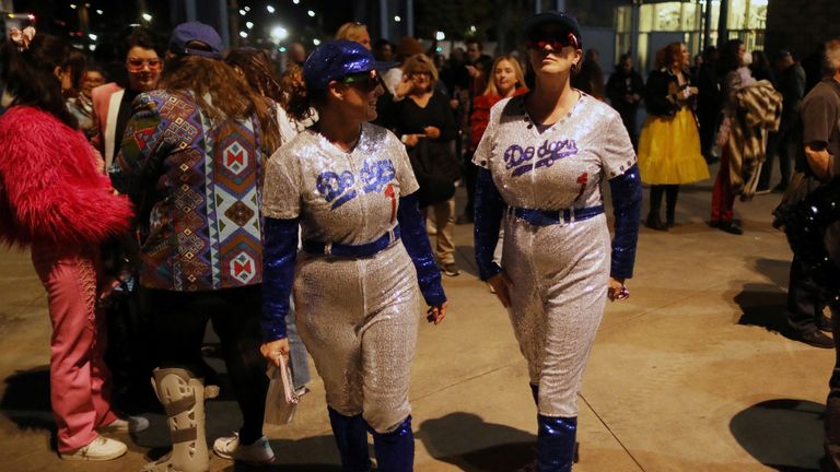 Fans walk in to see Elton John perform, as he wraps up the U.S. leg of his &#39;Yellow Brick Road&#39; tour at Dodger Stadium in Los Angeles, California, U.S. November 20, 2022. REUTERS/David Swanson