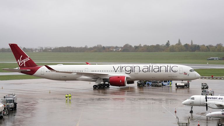 A Virgin Atlantic A350 Airbus, featuring Rain Bow ahead of departure at Birmingham airport. The plane called 'Rain Bow' is believed to be carrying the England's World Cup squad to Qatar. Picture date: Tuesday November 15, 2022.