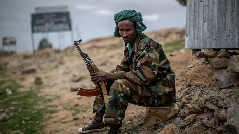 A fighter loyal to the Tigray People&#39;s Liberation Front (TPLF) mans a guard post on the outskirts of the town of Hawzen in the Tigray region of northern Ethiopia. Pic: AP