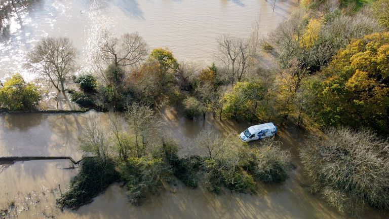 A van is left stranded in the floodwaters of the River Adur near Shermanbury in West Sussex. Motorists are being warned to stay off the roads as cars have become stuck in flood water caused by downpours and the UK prepares to suffer "miserable conditions" over the next two days. Picture date: Thursday November 17, 2022.

