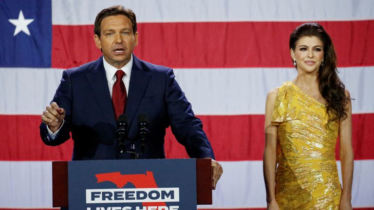 Republican Florida Governor Ron DeSantis speaks with his wife Kathy DeSantis during the 2022 U.S. Midterm Election Gala on November 8, 2022 in Tampa, Florida, U.S.  REUTERS/Marco Bello