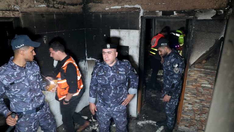 Palestinian Hamas police officers at the scene