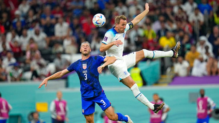 The USA&#39;s Walker Zimmerman fights for the ball against England&#39;s Harry Kane