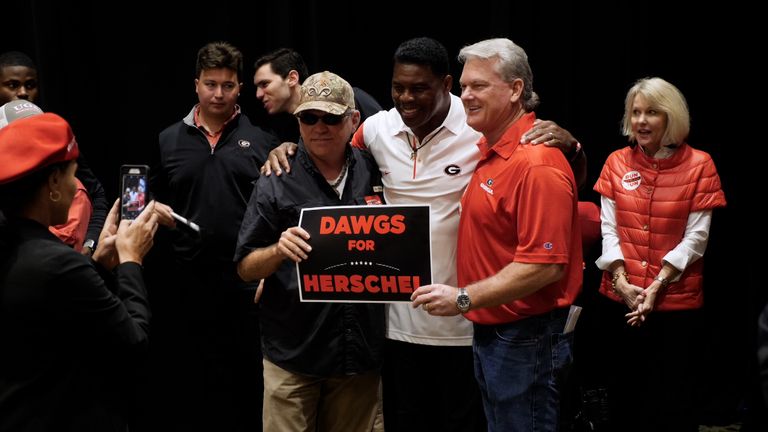 Republican Herschel Walker is a former American football star backed by former President Donald Trump