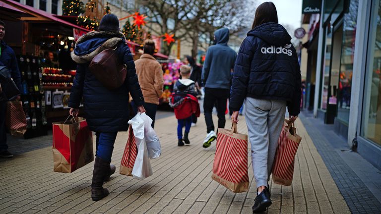 People go shopping in Bristol city center on the last shopping day of the Saturday before Christmas.  Photo date: Saturday December 18, 2021. Read Less Photo by: Ben Birchall/PA Archive/PA Images